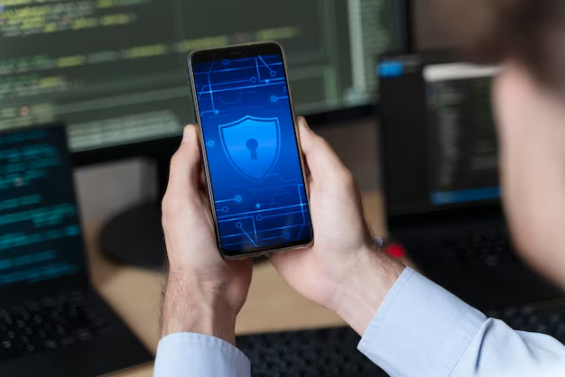 Hands holding smartphone with lock